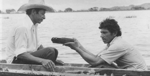 A man being interviewed on a boat in Ecuador