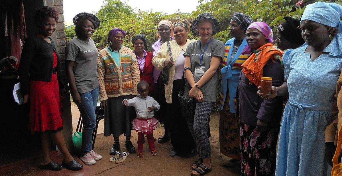 Sandra, from MASO, Amisa and Iona with the grannies, showing off their items