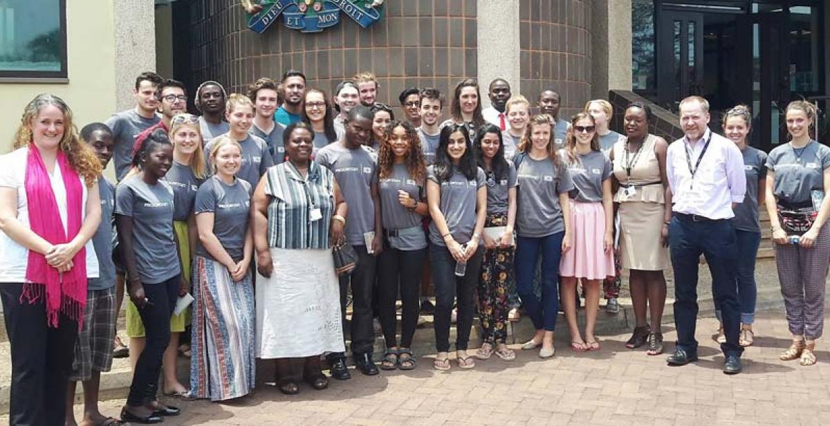 The Progressio ICS Malawi teams outside the DFID office with the Head and Deputy Head of DFID