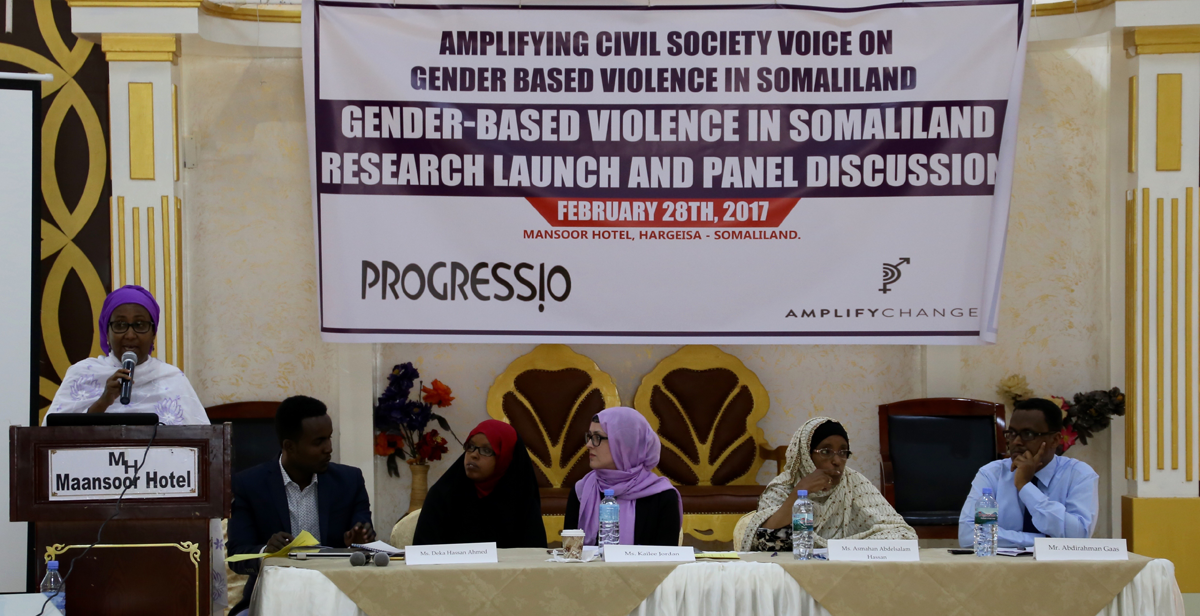 Kailee Jordan (middle of the group at the table), Progressio’s Somaliland Country Representative and civil society members at the public launch of the ‘Amplifying Civil Society Voice on Gender-Based Violence in Somaliland’ research project, in Hargeisa