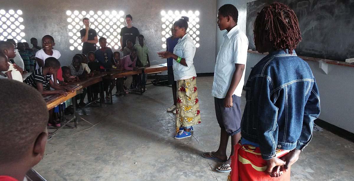 Children participating and listening during the sessions in Bewu