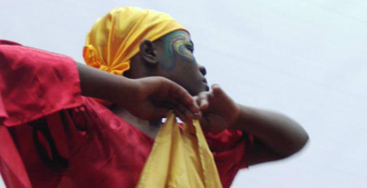 A member of the dance group Ayika performs