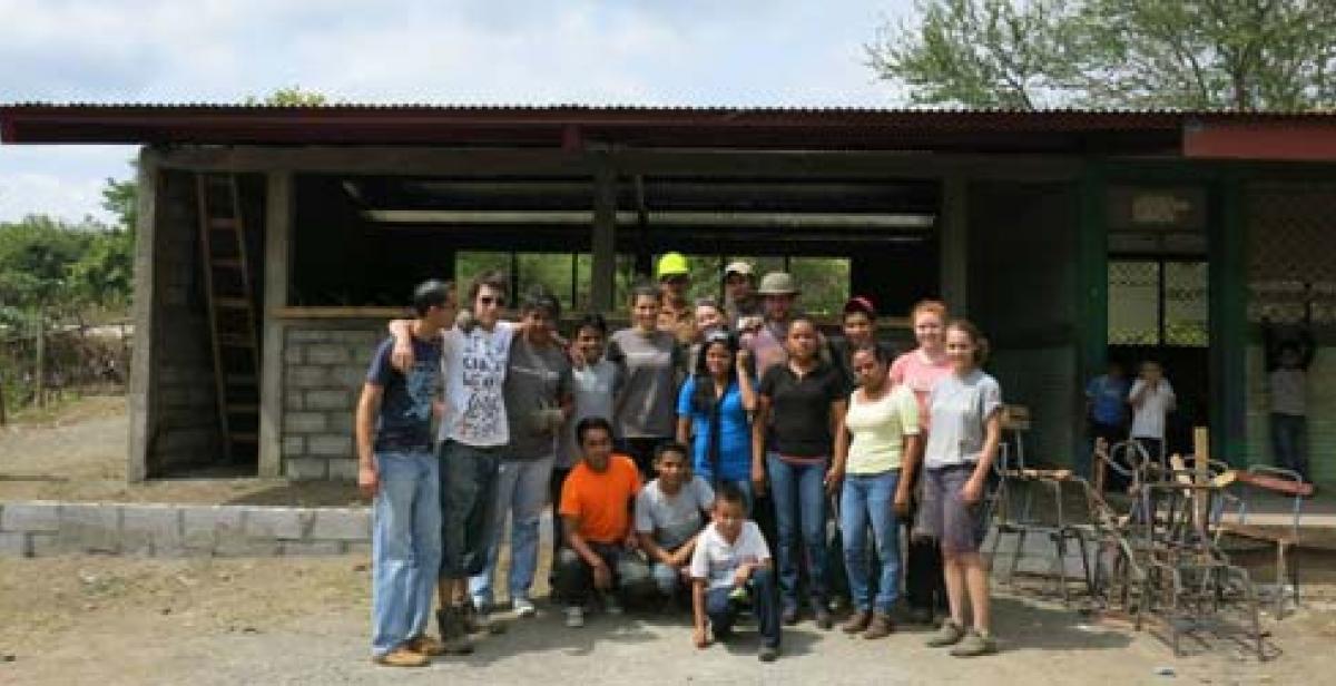 Team outside the finished classroom