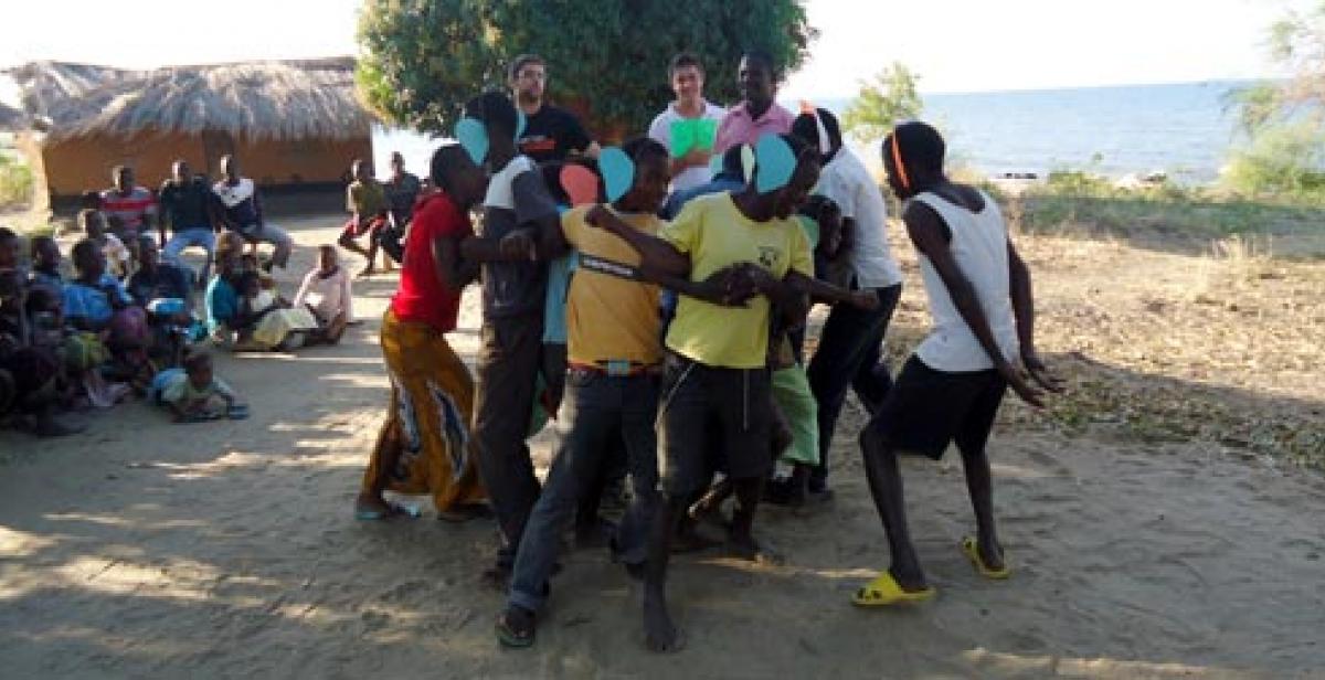 ICS Empower volunteers with young people from the Lozi community in Malawi