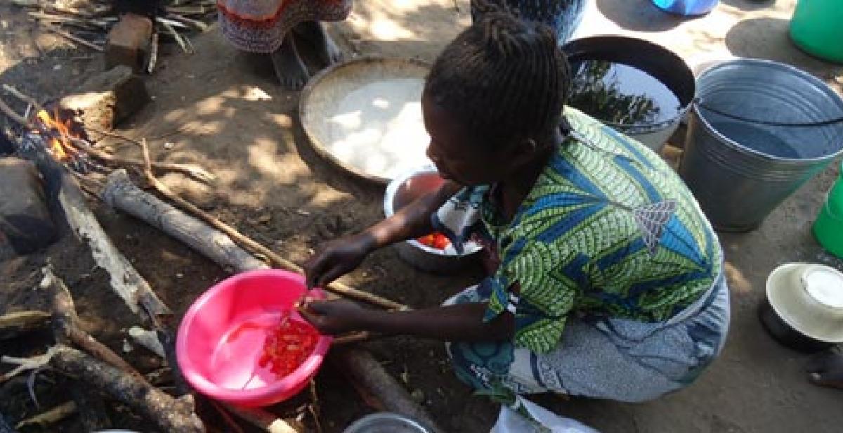 A woman preparing food in Malawi