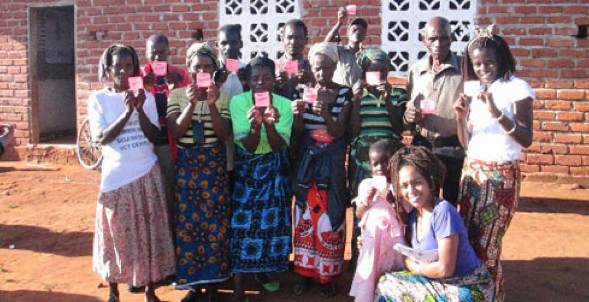 Group members pose with their confidence cards