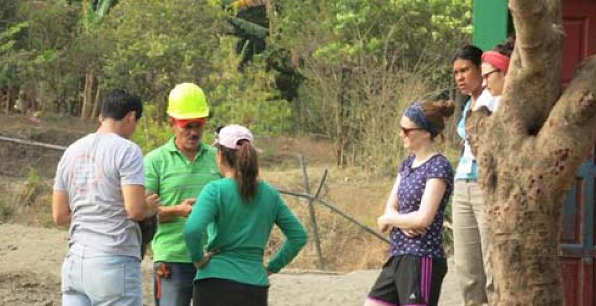 ICS volunteers with the Master of Work