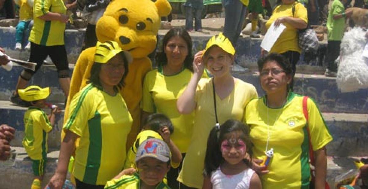 People watching the mini olympics at CEDEC, Peru