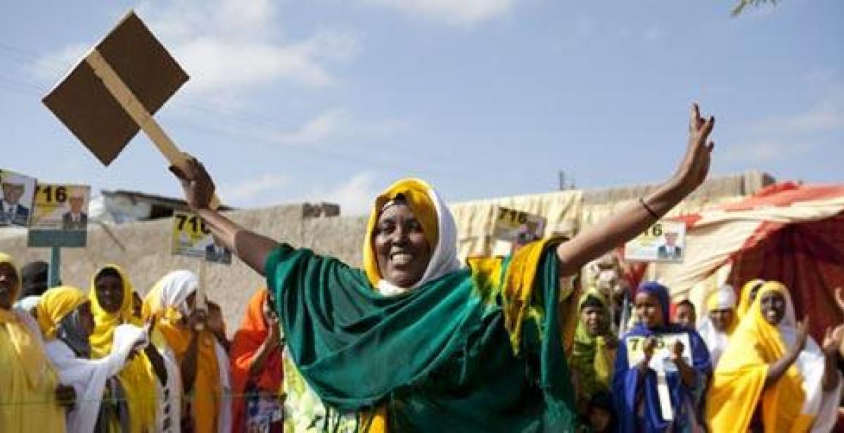 Woman campaigning ahead of local elections in November 2012