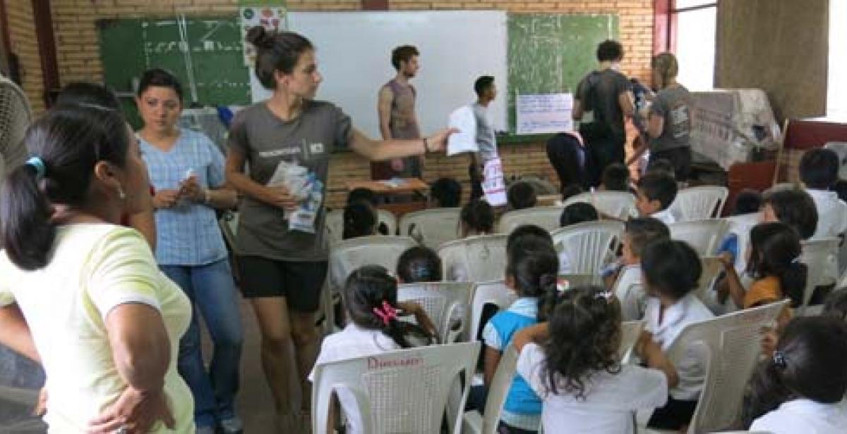 Session with school children on dental hygiene and hand washing
