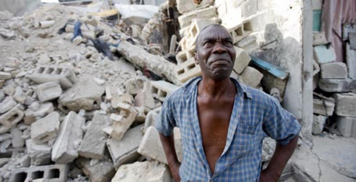 wilbert joseph surveys the rubble of his former home