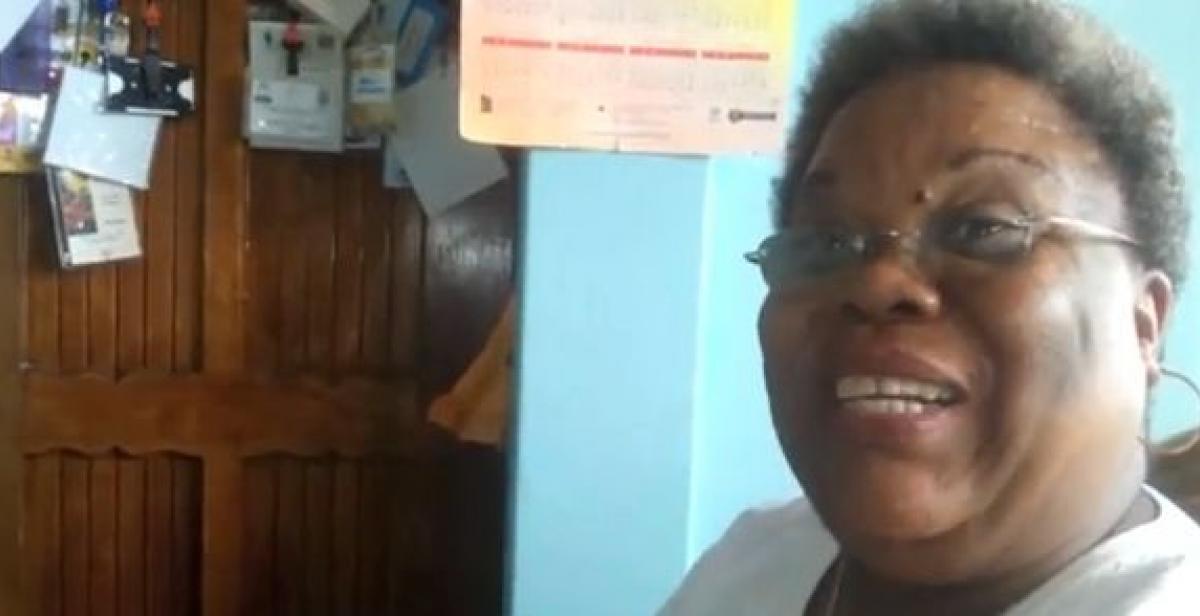 Dorotea Wilson speaking to camera, screenshot of YouTube video