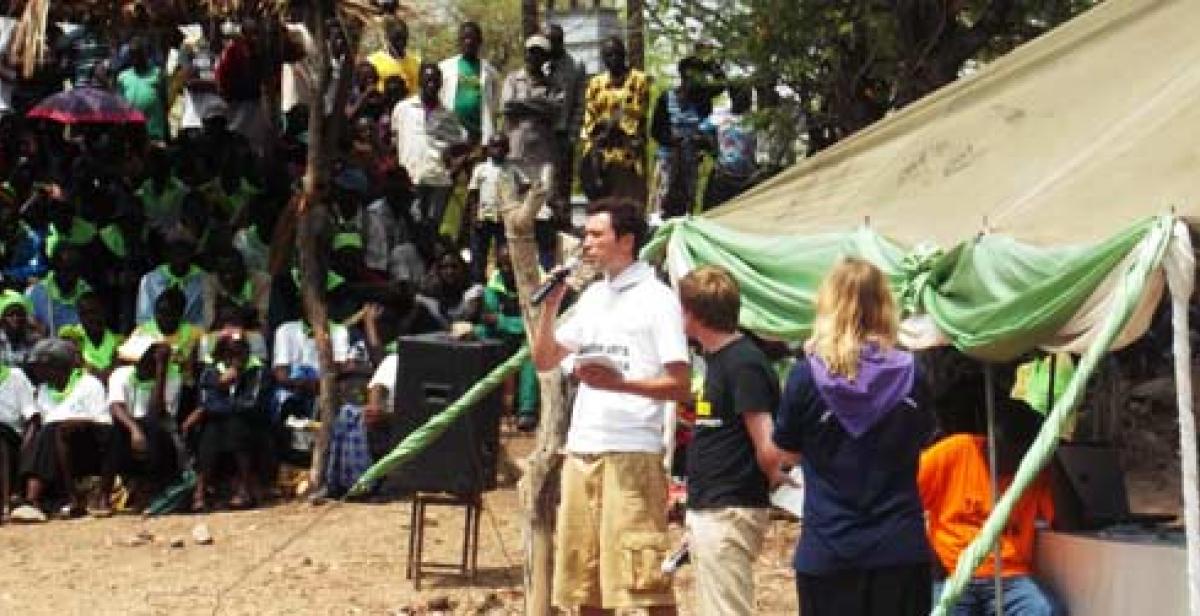 Progressio ICS volunteers speaking to a crowd