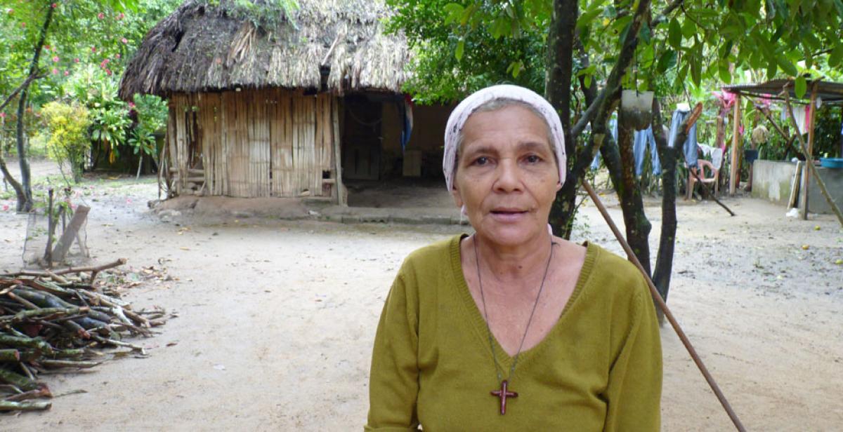 Mélida Tróchez outside her home in Honduras