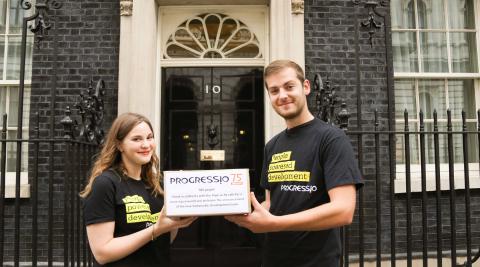 Jenny Vaughan, Campaigns Officer and Seb Scott, Action at Home Officer hand in petition to Number 10