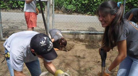 ICS volunteer Luvi Diaz working on the recycling centre