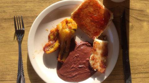 Breakfast - plantain, toast, frijoles and tamalito de elote