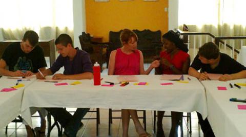 ICS Empower volunteers sitting at a table