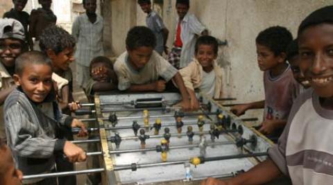 Yemeni boys play table football. (Nick Sireau/Progressio)