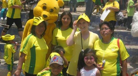 People watching the mini olympics at CEDEC, Peru