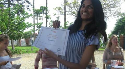Progressio ICS volunteers hold certificates