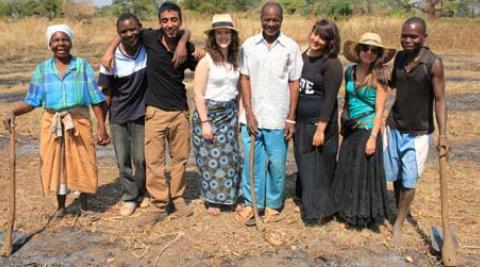 Volunteers with Chief Bandu, his mother and another villager