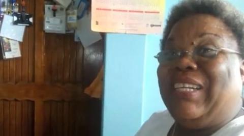 Dorotea Wilson speaking to camera, screenshot of YouTube video
